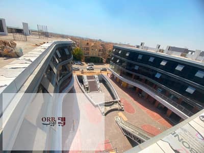 Shop for sale with immediate delivery in Yasmin Villas, New Cairo, located in the first mall serving the area. Total area 83 sqm, currently rented to