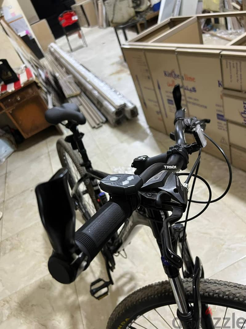 Trinx m136 pro 4