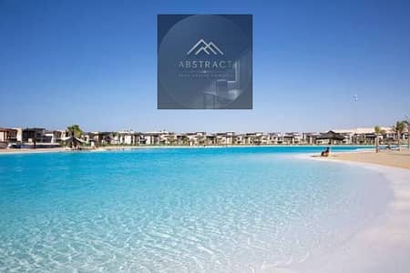 Villa for sale, 610 square meters, first row, double view of the sea and lagoon in Swan Lake, North Coast, M. Hassan Allam