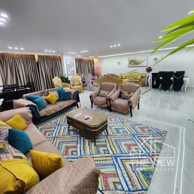 Penthouse for sale with a share of the land directly on the main road in Khamael Compound, Sheikh Zayed. Super deluxe finishing