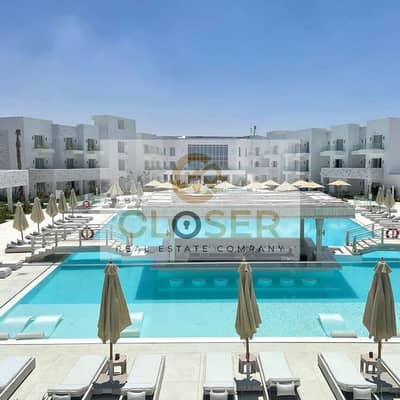 Own the best chalet layout in Azha, Ras Al Hekma, with two bedrooms and a down payment of 800,000.