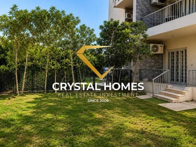 Apartment for sale in a compound in Zayed, ground floor with garden, high luxury