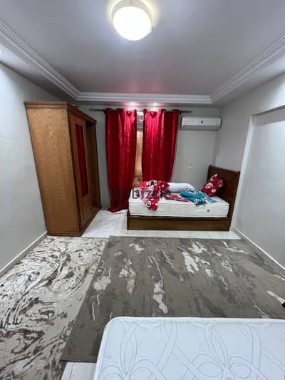 For rent, a furnished and air-conditioned apartment near the Faculty of Medicine with two bedrooms and a reception.