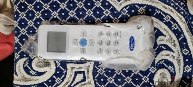 ٥ ريموت تكييف كارير جداد بالحامل اصلي خلع تكييف
