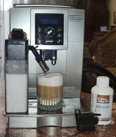 لقطة ماكينه قهوة سبريسو ديلونجي أوتوماتيك بنصف تمنها  Coffe espresso