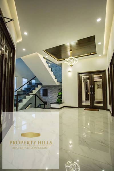 A very distinguished villa for a limited time with only 5% down payment in a compound with high community standards and privacy, with a landscape view, fully smart, secure, and guarded in the assembly on the Suez Road and Sodic villa