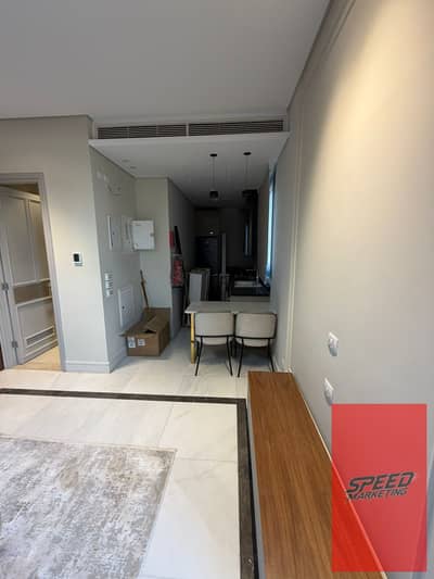 Two-room hotel apartment in the best location, on Mohamed Naguib Street, close to all services and 3 minutes away from 90th Street, Al Rehab Street, a