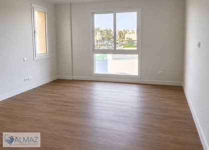 Unfurnished 215 sqm apartment for rent in Mivida Compound, Fifth Settlement, near South 90th Street. Includes kitchen, air conditioning, and appliance