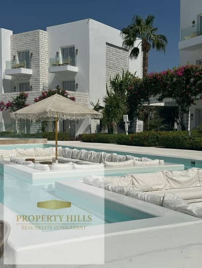 Received an independent villa by the sea with finishing, air conditioning, and kitchen for sale in Azha - North Coast