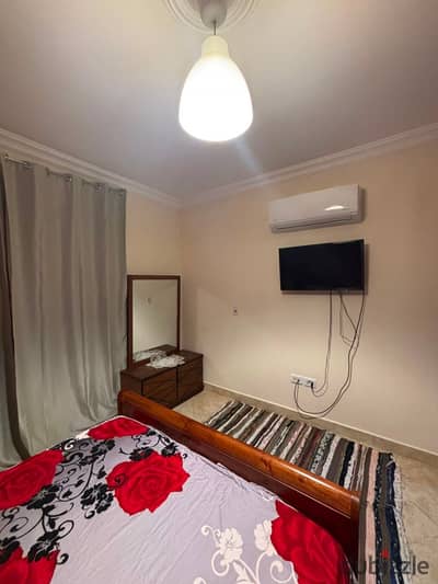 Studio for sale with furniture, devices, and air conditioners 64 meters Talat Mostafa Steps for services, movement, and Thawth Park Bedroom Ground floor without a garden. Fully furnished and air-conditioned.