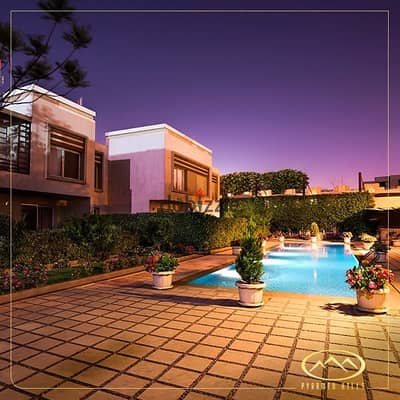 ground apartment for sale in Pyramid Hills fully finished with Kitchen and Acs 3 bedrooms 3 bathrooms 210 sqm with small garden