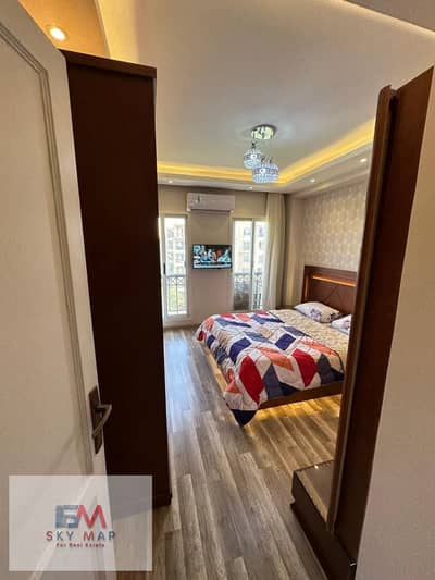 For rent (furnished): A 135m² apartment in Madinaty (Zone B1), situated directly next to the service area in a prime location. It features "super-lux"
