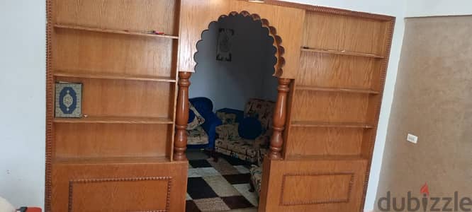مكتبه على شكل ارج