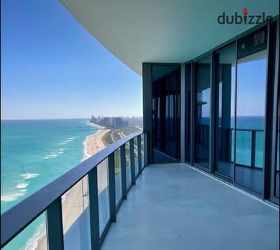 Receive now apartment VIP in El Alamein Towers double-view , directly on the sea, fully finished with hotel finishing, immediate delivery