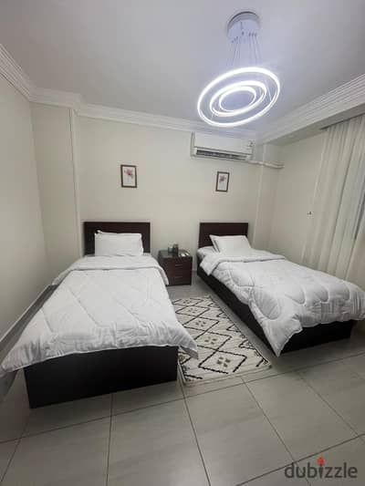 Furnished apartment branching from Midan Al-Masahah, Dokki