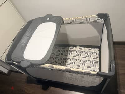 Two Joie Commuter change travel cots