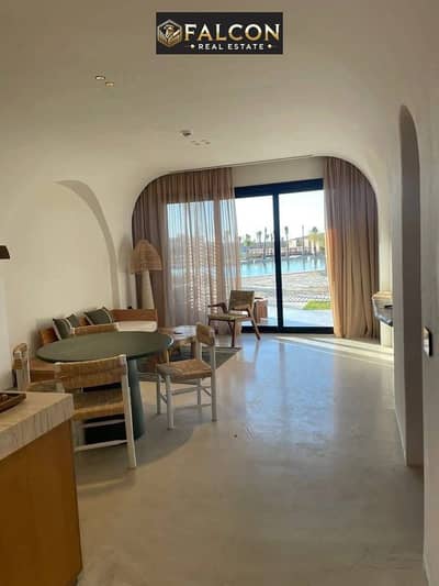 Ready-to-move-in chalet in prime location with lagoon view, fully finished with air conditioning, for sale in Zoya Ghazala Bay, North Coast.