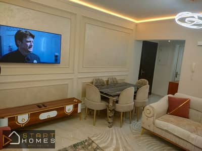 Furnished 100-square-meter, two-bedroom apartment for rent in Madinaty (B15); features custom finishes and a prime location close to all amenities. Furnished 100-square-meter, two-bedroom apartment for rent in Madinaty (B15); features custom finishes and a prime location close to all amenities.
