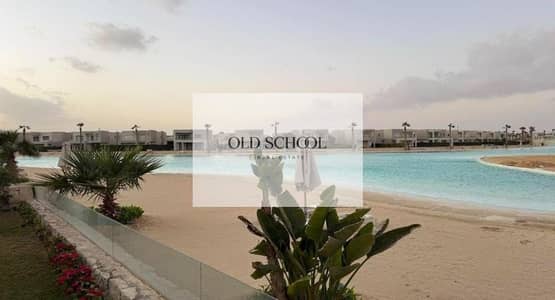 Chalet Ground with garden direct on lagoon fully finished with kitchen and ACs for sale in Azha North Coast