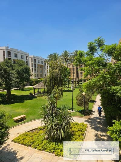 Freehold apartment for sale in Al Rehab City, New Cairo; features a wide garden view and is located next to the Old Market and amenities.