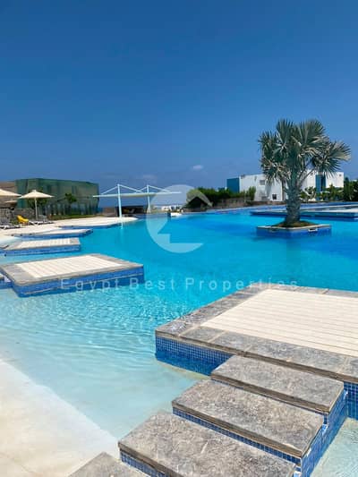 أفخم شاليه فندقي Fouka Bay – Direct Lagoon View متشطب بالكامل و بالتقسيط علي 9 سنين بأقل مقدم في الساحل الشمالي - فوكا باي