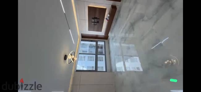 New apartment for rent in One Katameya Compound, fully furnished with air conditioning, kitchen, and a parking space. First occupancy.