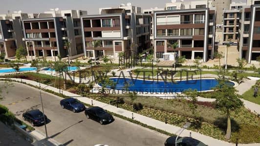 شقة بحديقة خاصة للبيع في ميدتاون القاهرة الجديدة Midtown نصف تشطيب جاهزة للاستلام بموقع مميز مع جراج وحديقة