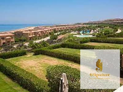 For sale: Super Lux finished chalet in the stepping phase of Telal Ain Sokhna, immediate delivery, open view overlooking a garden.