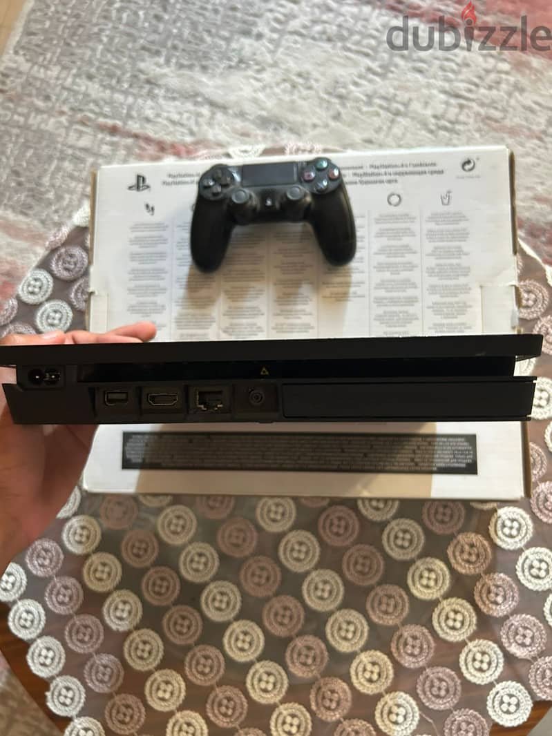 PlayStation 4 Slim 1TB + Original Controller 1