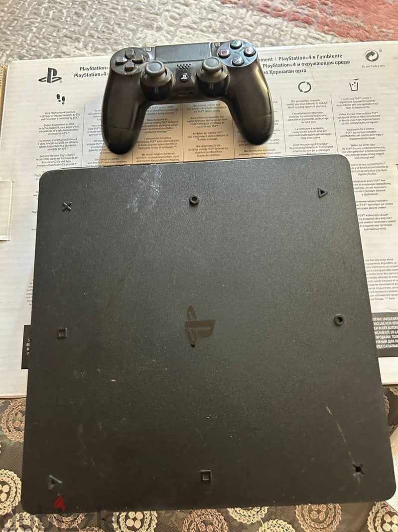 PlayStation 4 Slim 1TB + Original Controller 5
