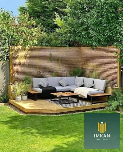 3-story villa for sale in Sarai Compound, featuring 6 bedrooms and a private garden. Installment plan available over 12 years. Located in Mostakbal Ci