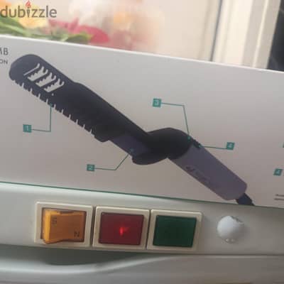 مشط كهربائي للتصفيف