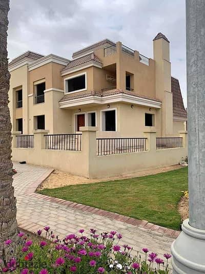 Corner villa for sale, ready for viewing, with installments over 12 years, on the Suez Road in Sarai Compound.