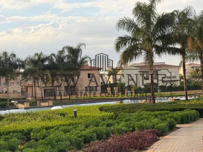 palace ready to move with a huge garden very prime location Direct on landscape and water features in mivida new cairo 2 min from auc