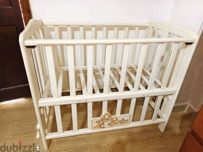 Baby crib with mattress