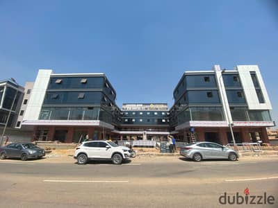 Ground floor commercial shop for immediate occupancy in New Cairo.  X PLAZA MALL - Yasmin Villas - One minute from Sadat Axis - Next to Nile International School - Plan from Manchester School - Area 88 sq m - Price = 24,640,000 - 50% down payment =