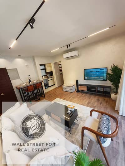 studio 65m for sale in privado with furniture garden view