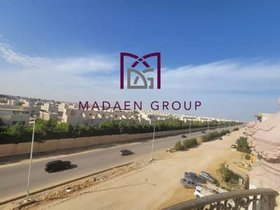 210m apartment in front of Grand Heights on Boulevard Axis and in front of Mountain View and minutes to the entrance of Zayed 4 and Mall of Arabia