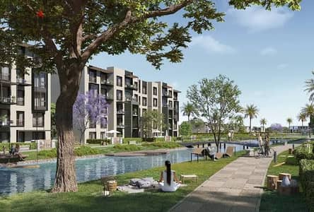 A distinctive apartment for sale in Garden Lakes Compound by Hyde Park, measuring 113 square meters – 3rd floor – with a direct view of the lake.    P
