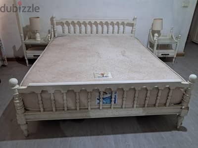king size bed with two side tables