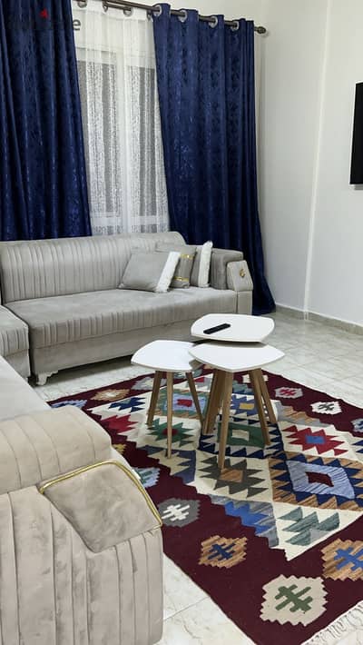 Apartment for rent 131m fully furnished near Avenue Mall services and the gate at a special price air conditioned modern furniture in Rehab 2 Phase 10