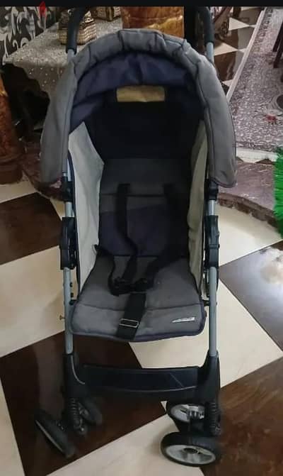 عربة اطفال جونيور وارد الخارج