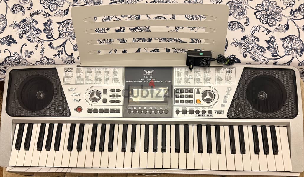 Angelet electronic keyboard & harmonica & flute 1
