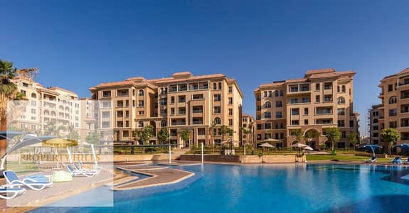 Fully finished ground floor apartment with private garden for sale in 90 Avenue, New Cairo. Immediate delivery, low down payment, and extended install