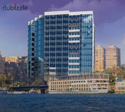 Hotel apartment with a glass facade overlooking the Nile Corniche, in a strategic location next to the Hilton Maadi Hotel.