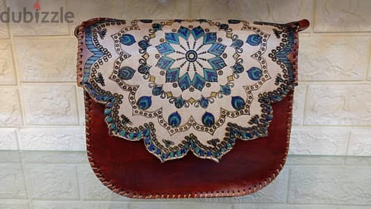 شنطه كروس جلد طبيعي 100 في %  شغل يدوي Handmade