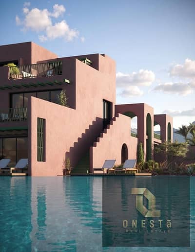 Two-bedroom ground-floor chalet with garden for sale – sea view – with a 22% discount and payment plans up to 9 years in Makadi Heights, Red Sea.