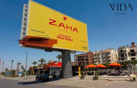 Apartment for sale in ZAHA Residence, 6 October, on Wahat Road, with installments and lowest sqm price