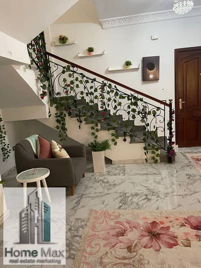 Duplex for rent, elevated ground and first with a private garden in the eighth district, Sheikh Zayed