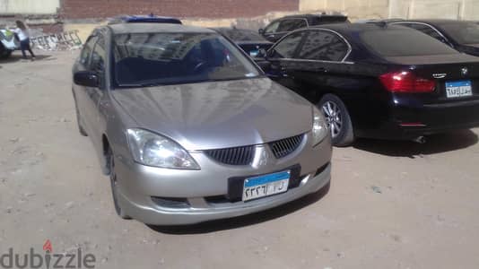 حاله مميزة ميتسوبيشر لانسر اتوماتيك موديل ٢٠٠٦ يابانى الصنع موتور ١٦٠٠